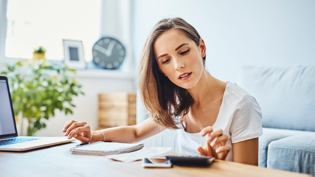 A girl calculates the rate of a home loan